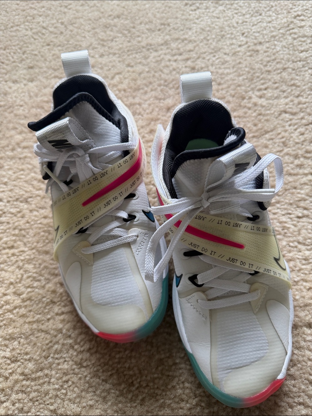 Nike Kids White Sneakers with Pink and Teal Accents
